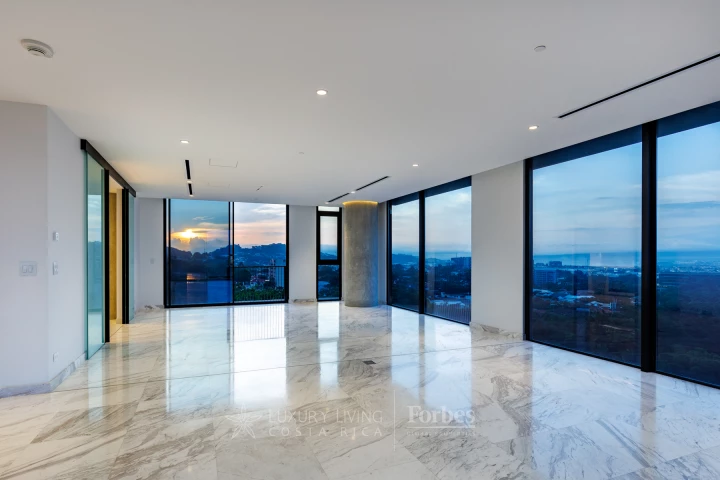 A furnished Costa Rica living space with warm wood details.